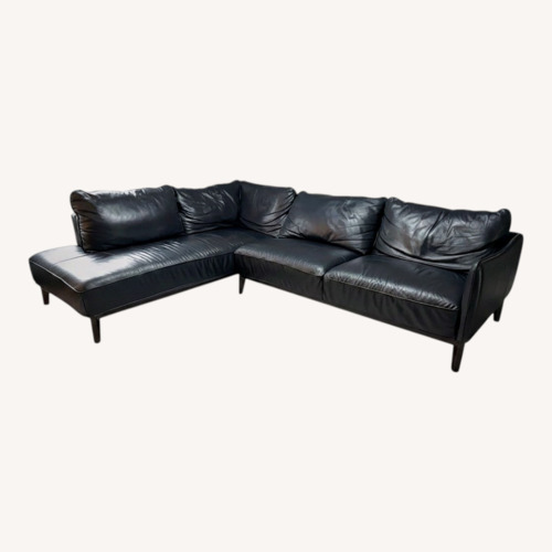 Used Calvin Klein Dark Blue Leather Sectional for sale on AptDeco