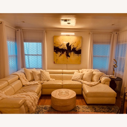 Used Natuzzi 3 Piece Cream Leather Sectional for sale on AptDeco