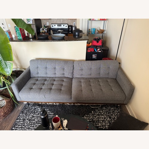 Used Mid Century Tufted Grey Sofa for sale on AptDeco