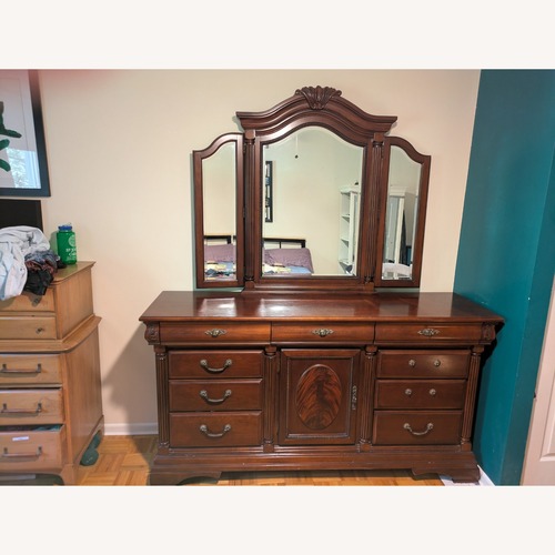 Used Levitz Dark Wood Dresser w Mirror  for sale on AptDeco