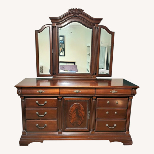 Used Levitz Dark Wood Dresser w Mirror  for sale on AptDeco