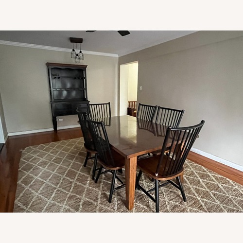 Used Dark Brown Wood Dining Table with 6 Chairs for sale on AptDeco