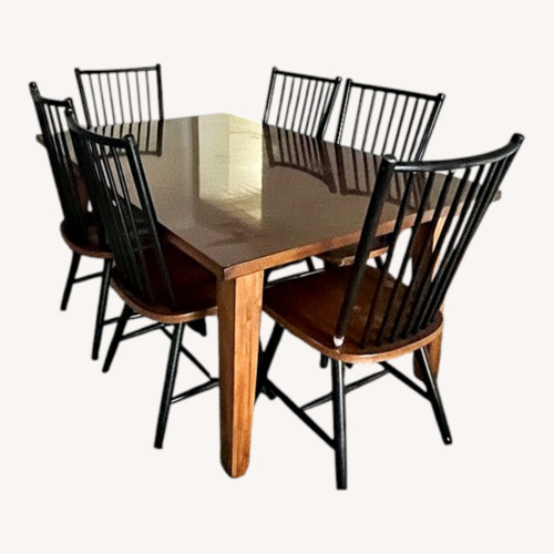 Used Dark Brown Wood Dining Table with 6 Chairs for sale on AptDeco
