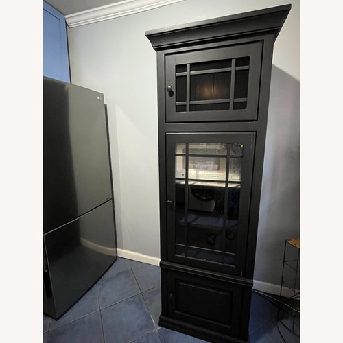 Used Vintage/Antique Black Wood Armoire for sale on AptDeco