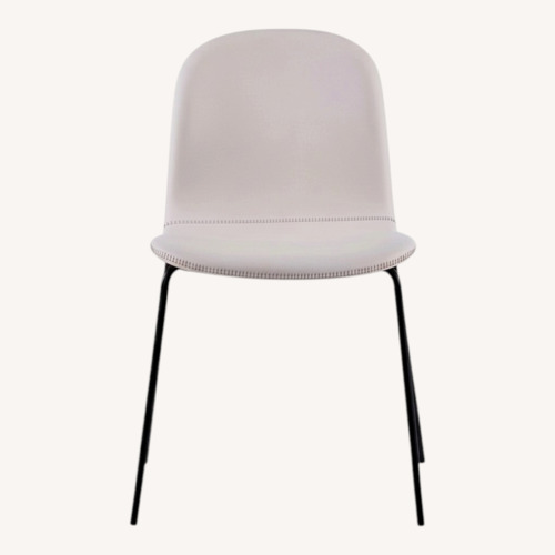 Used CB2 Primitivo White Faux Leather Dining Chairs for sale on AptDeco