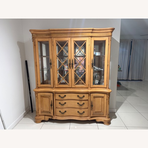 Used Light Brown Wood Armoire for sale on AptDeco