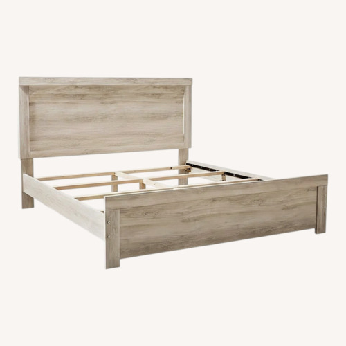 Used Ashley Furniture Light Gray Wood King Bed for sale on AptDeco