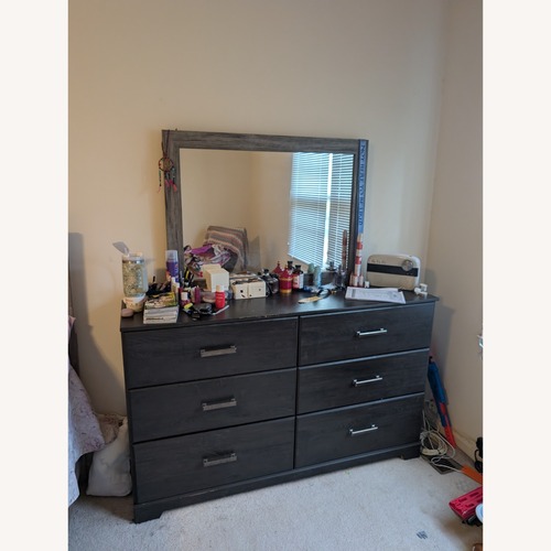 Used Ashley Hollymount Dark Brown Wood Floor Mirror for sale on AptDeco