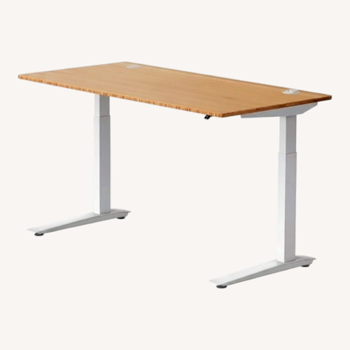 Used Herman Miller Light Brown Bamboo Desk for sale on AptDeco
