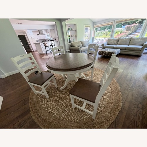 Used Kathy Kou Farmhouse Round Dining Table + 4 Chairs for sale on AptDeco