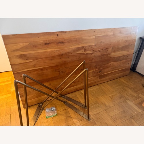 Used Solid Wood Table with Gold Metal Legs for sale on AptDeco
