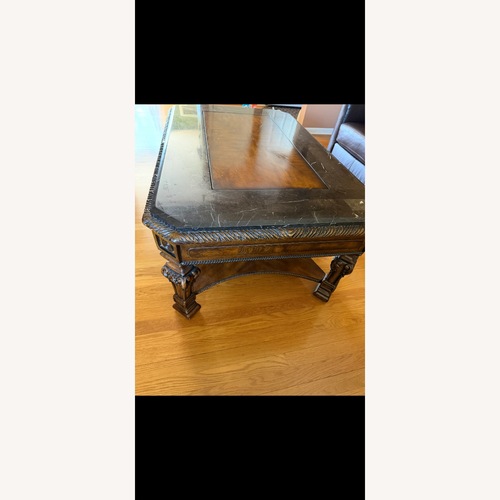 Used Raymour & Flanigan Marble Coffee Table for sale on AptDeco