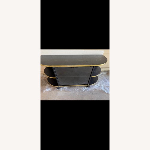 Used Raymour & Flanigan Black Wood Media Storage for sale on AptDeco