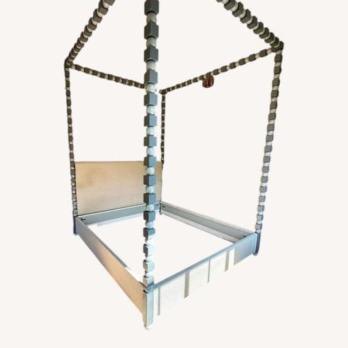 Used Geometric Canopy Bed Frame for sale on AptDeco