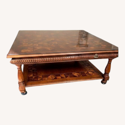 Used Theodore Alexander Dark Brown Wood Coffee Table for sale on AptDeco