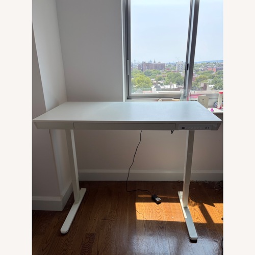 Used Adjustable Sit Stand Desk for sale on AptDeco