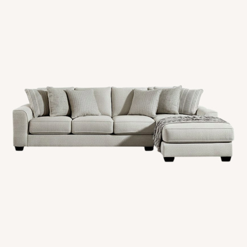 Used Ashley Furniture Light Gray 3+ Piece Sectional for sale on AptDeco