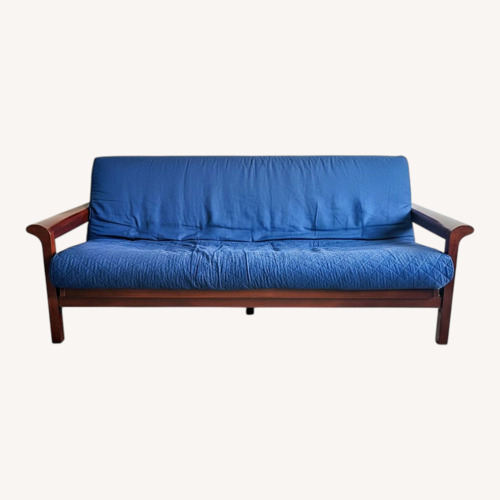 Used Vintage/Antique Dark Brown Wood Futon for sale on AptDeco