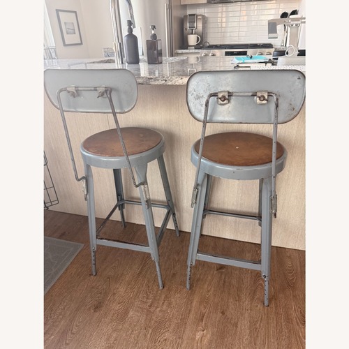 Used Matched Pair Vintage Metal Draft Stools from NASA for sale on AptDeco