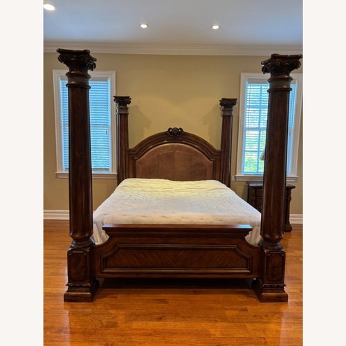 Used Regal 4 poster King Bed for sale on AptDeco