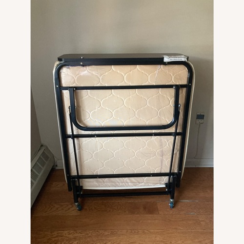 Used Natural Metal Twin Bed for sale on AptDeco