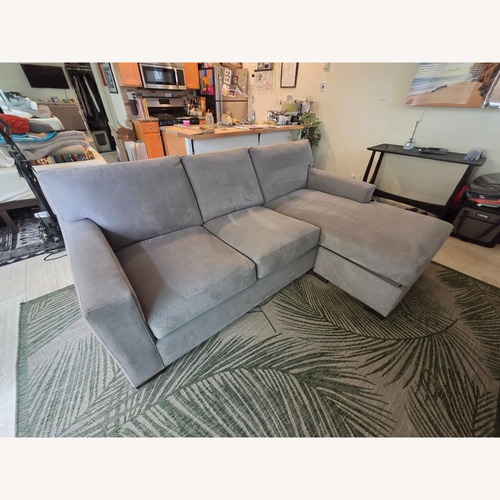 Used Crate & Barrel Axis 88" Reversible Storage Chaise for sale on AptDeco
