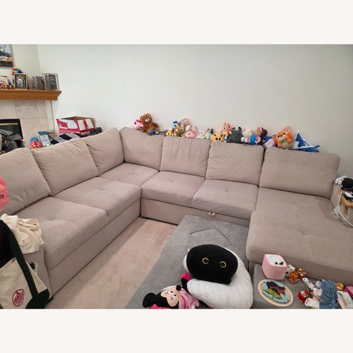 Used Living Spaces Light Brown 3+ Piece Sectional for sale on AptDeco