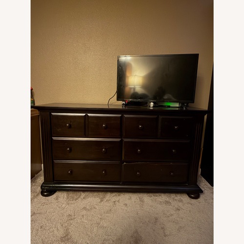Used Dark Brown Wood Dresser for sale on AptDeco