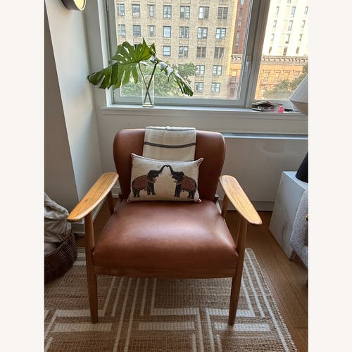 Used CB2 Troubadour Saddle Leather Wood Frame Chair for sale on AptDeco