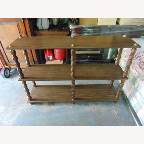 Used Vintage/Antique Finds Dark Brown Media Shelf for sale on AptDeco