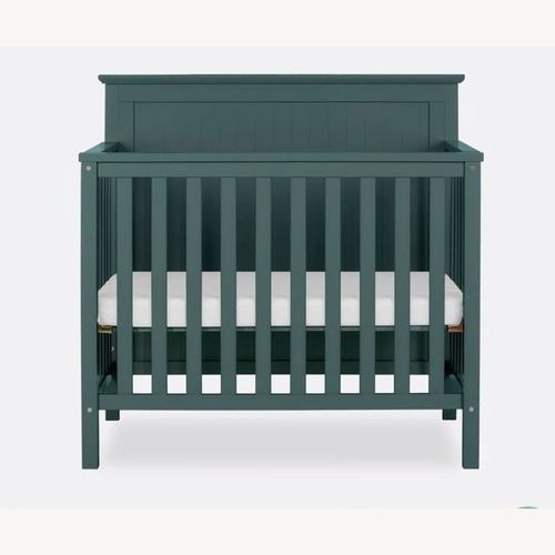 Used Dream on Me Ava 4-in-1 Convertible Mini Crib for sale on AptDeco