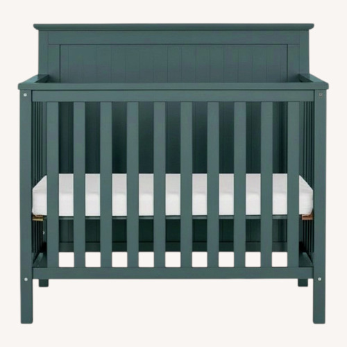 Used Dream on Me Ava 4-in-1 Convertible Mini Crib for sale on AptDeco
