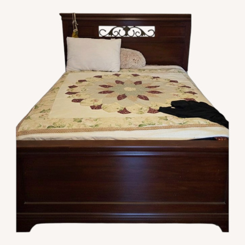 Used Dark Brown Wood Queen Bed for sale on AptDeco