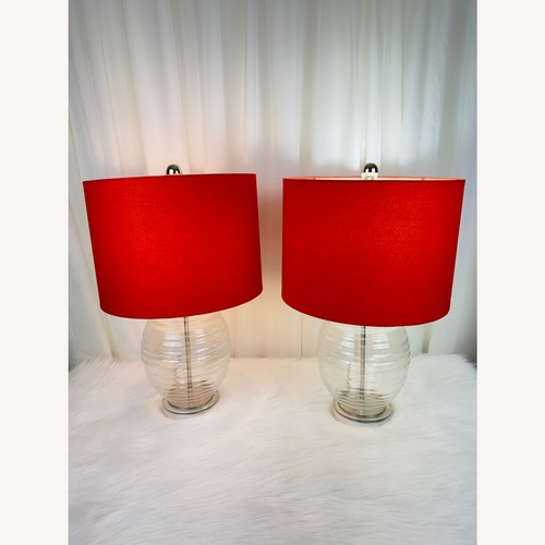 Used Two Clear Glass Lamps with Orange Shades for sale on AptDeco