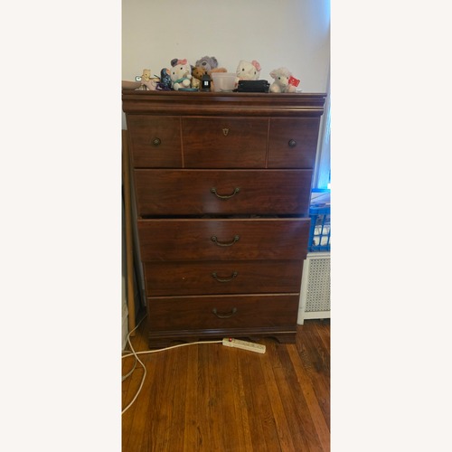 Used Dark Brown Wood Dresser for sale on AptDeco