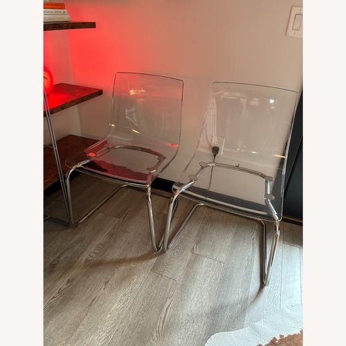 Used IKEA Tobias Transparent Chrome Dining Chair (x2) for sale on AptDeco