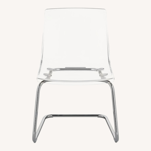 Used IKEA Tobias Transparent Chrome Dining Chair (x2) for sale on AptDeco