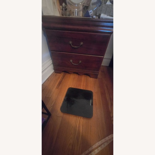 Used Dark Brown Wood Nightstand for sale on AptDeco