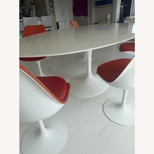 Used Eero Saarinen White Tulip Dining Chairs for Knoll for sale on AptDeco