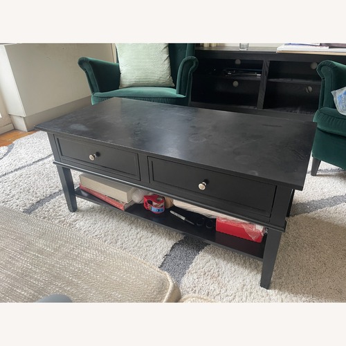 Used Black Coffee Table with Storage Drawers and Shelf for sale on AptDeco
