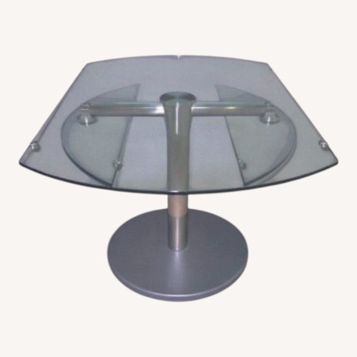 Used Glass and Stainless Steel Pedestal Dining Table for sale on AptDeco