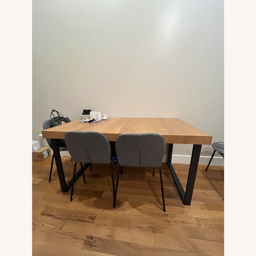 Used IKEA Tarsele Oak Veneer/Black Dining Table for sale on AptDeco