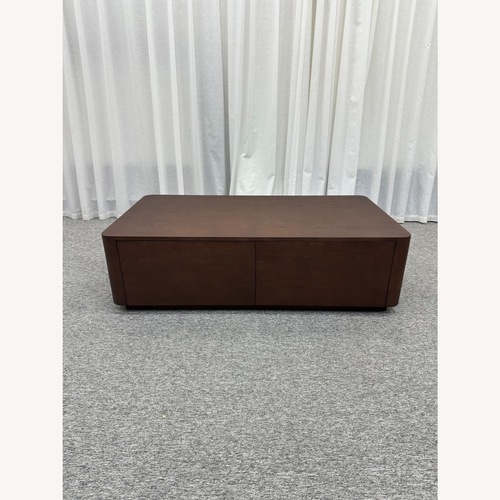 Used Dark Brown Ash Wood Coffee Table for sale on AptDeco