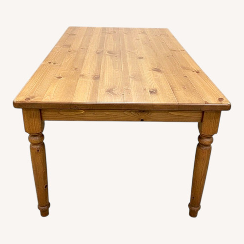 Used Pier 1 Spindle Leg Rectangular Dining Table for sale on AptDeco