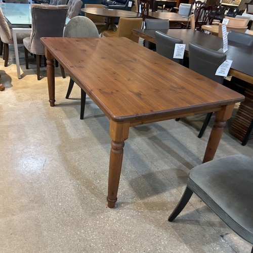 Used Pier 1 Spindle Leg Rectangular Dining Table for sale on AptDeco