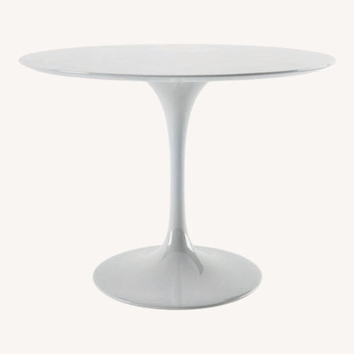 Used Modholics 42" White Round Fiberglass Tulip Dining Table for sale on AptDeco