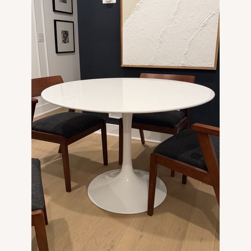 Used Modholics 42" White Round Fiberglass Tulip Dining Table for sale on AptDeco
