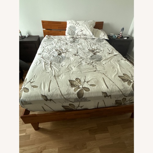Used Queen Size Wooden Bed Frame for sale on AptDeco
