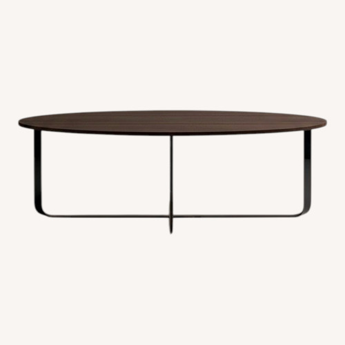 Used Burnt Oak Wood Oval W Gorgeous Titanium Base Table for sale on AptDeco