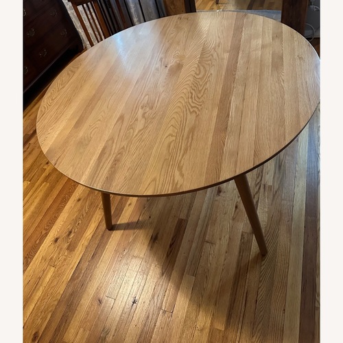 Used Article Seno 47" Oak Round Dining Table  for sale on AptDeco